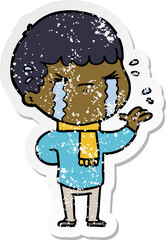 distressed sticker of a cartoon man crying