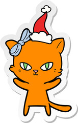 cute sticker cartoon of a cat wearing santa hat