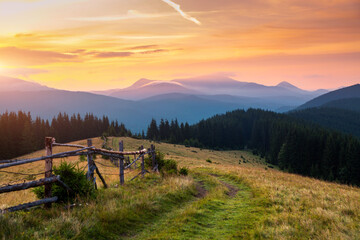 Fototapeta na wymiar Utterly spectacular view of the sunset over the mountain ranges. Carpathian mountains, Ukraine.