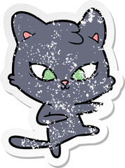 distressed sticker of a cute cartoon cat