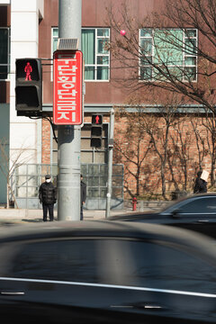 Red traffic light in city