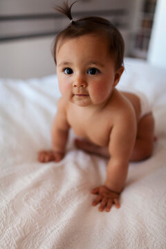 BABY CRAWLING ON BED