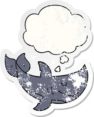 cartoon shark and thought bubble as a distressed worn sticker