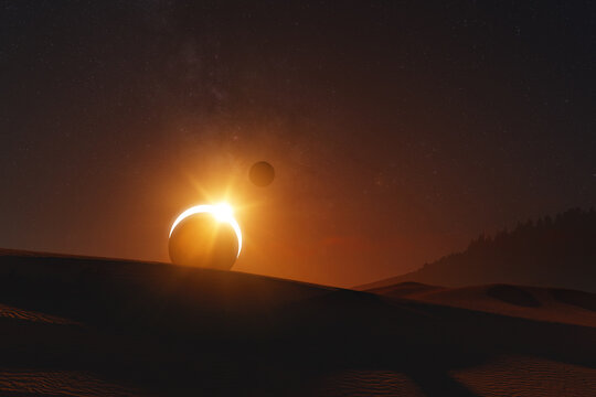 Solar eclipse over some desert dunes