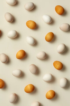 Natural colored and golden wooden Easter eggs.