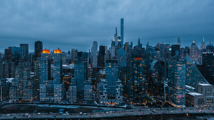 Uptown Manhattan in the evening lights, drone panorama of New York
