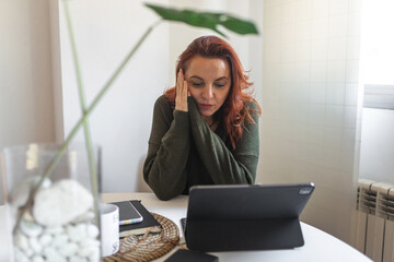 mature woman working from home