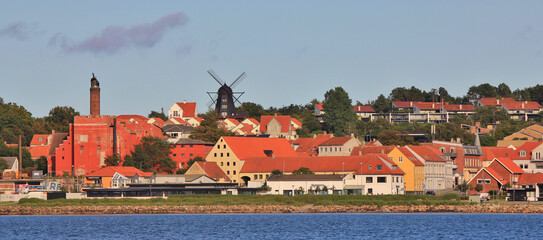 Old windmill and other buildings in Ebeltoft, Denmark.