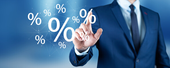 hand touches virtual percent icon.