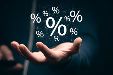 hand touches virtual percent icon.