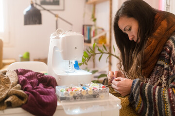 Sewing clothes and fixing handmade bag at home