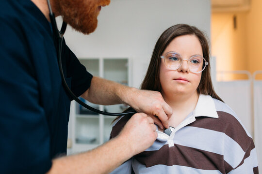 Physician Examining Young Woman 