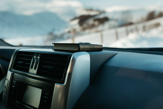 small Quran in the car