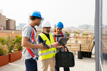 Workers discussing in front of solar power station