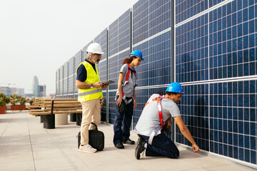 Workers examining solar power station