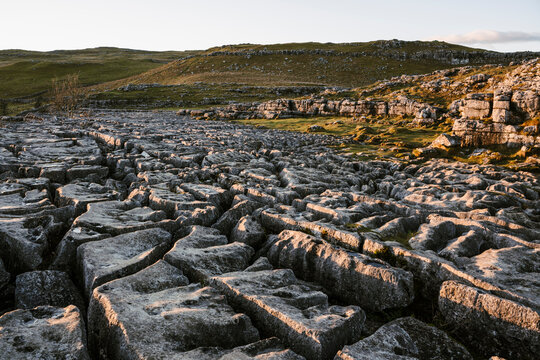Malham cove limestone pavement at sunset