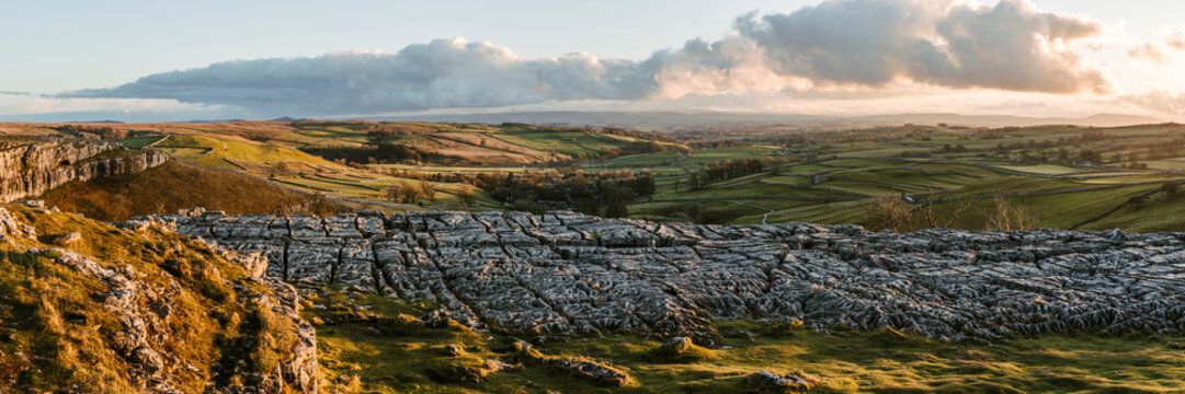 Panoramic view of Malham Cove at sunset