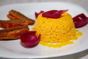 Traditional couscous with sardines and pickled onions. Brazilian popular dish