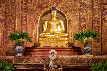 The Phra Buddha Sihing statue in the Viharn Lai Kham at Wat Phra Singh , Chiang Mai , Thailand