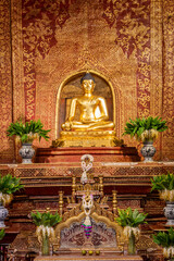 The Phra Buddha Sihing statue in the Viharn Lai Kham at Wat Phra Singh , Chiang Mai , Thailand