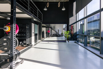 General view of main gym, personal training and fitness center room