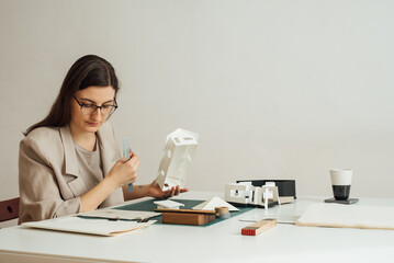 Female Architect Working in Studio