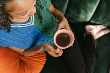 happy young woman drinking tea