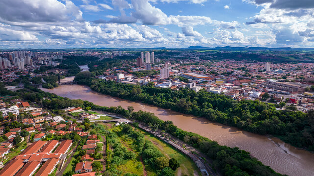 Aerial view of the city of Piracicaba, in Sao Paulo, Brazil. Piracicaba River with trees, houses and offices
