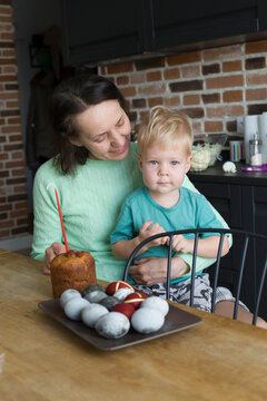 Woman ,boy and easter eggs