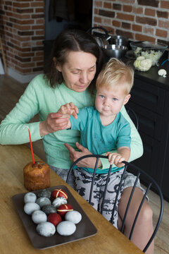 Woman ,boy and easter eggs