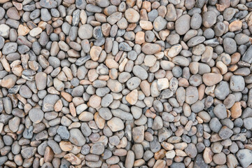 Grey and brown coloured pebbles