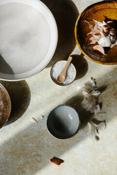 Garlic and sea salt on a sunny tabletop