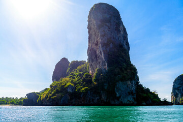 Fototapeta na wymiar Cliff rock in azure water, Ko Rang Nok, Ao Phra Nang Beach, Ao Nang, Krabi, Thailand
