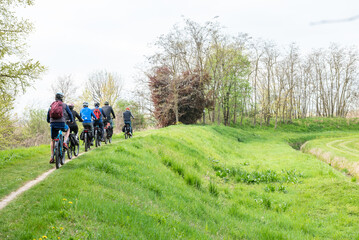 Fototapeta premium a group of cyclists riding