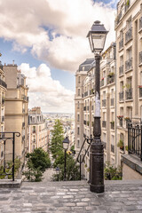 A beautiful antique street lamp in Montmartre, in Paris, France. Shallow focus for effect on the...