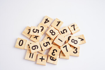 Number wood block cubes for learning Mathematic, education math concept.