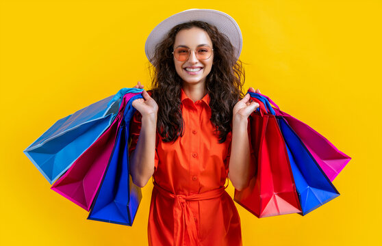 glad shopping woman at summer sale on background. photo of shopping woman - Powered by Adobe
