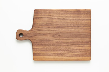 Wooden cutting board. Handmade walnut wood cutting board on white background.