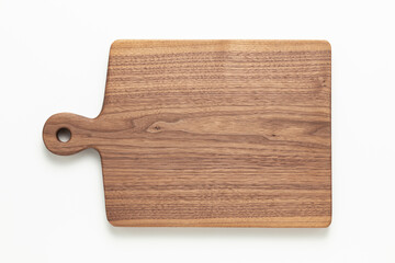 Handmade walnut wood cutting board on white background. wooden cutting board