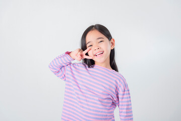 Image of Asian child posing on white  background