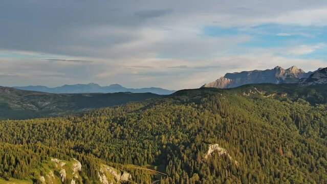 Aerial view of Maglic Mountain in National park Sutjeska. The highest mountain of Bosnia and Herzegovina, beautiful panorama landscape at sunset, 4k