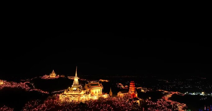 aerial view The lights decorate the palace and the pagoda at the top of the mountain at night, .beautiful and spectacular..An annual festival of city lights and fireworks..Colorful lights decorate .