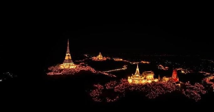 aerial view The lights decorate the palace and the pagoda at the top of the mountain at night, .beautiful and spectacular..An annual festival of city lights and fireworks..Colorful lights decorate .