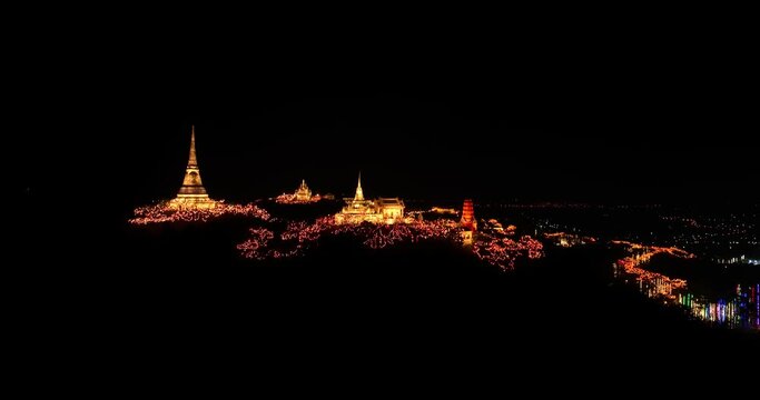 aerial view The lights decorate the palace and the pagoda at the top of the mountain at night, .beautiful and spectacular..An annual festival of city lights and fireworks..Colorful lights decorate .