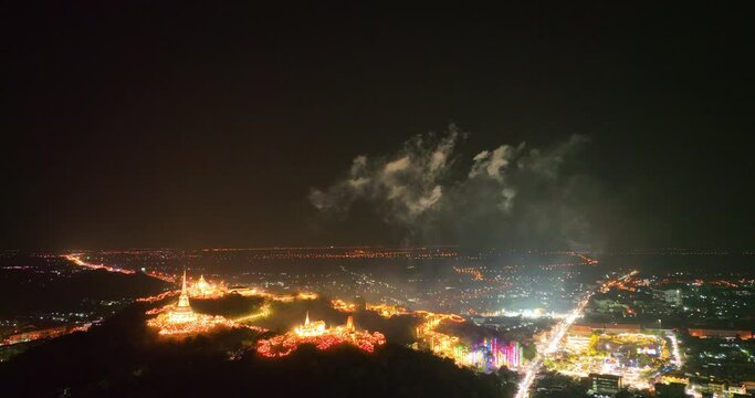 aerial view The lights decorate the palace and the pagoda at the top of the mountain at night, .beautiful and spectacular..An annual festival of city lights and fireworks..Colorful lights decorate .