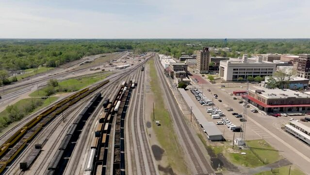 Train tracks in Texarkana, Arkansas with drone video pulling back.