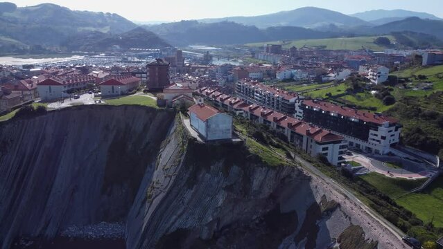 Dramatic geology: Steep slab rock cliff on flysch beach, Zumaia Spain