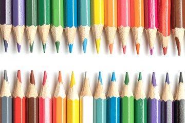 Colored pencils lie in a row. A line drawn with pencil tips. Set of crayons for illustrations, art, study. Ready for school.