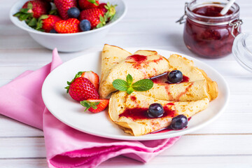 Fruit Pancakes. Strawberry Pancakes, Raspberry, Blueberry, and Chocolate topping
