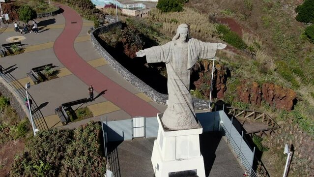 The Majesty of Cristo Rei Statue Viewed from the Sky: Aerial Stock Footage on Madeira Island